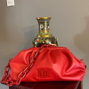 Red chain link handbag